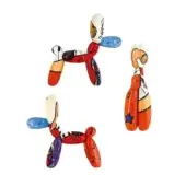 Picasso-style balloon dog sculptures, glossy piano finish, abstract patterns in red, orange, blue, black, and white.