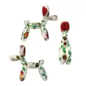 Ceramic balloon dog sculptures with rose finish, featuring painted red and pink roses, green vines, and colorful butterfly motifs.