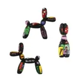 Balloon dog sculptures by Juliarte, pat pop finish, with graphic elements—spotted, yellow, purple, green—and text like “GIRL POWER”, “POP ART”.