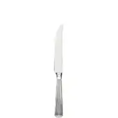 Stainless steel steak knife with curved blade, ribbed handle, and polished finish against a white backdrop.