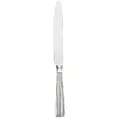 Silver table knife with ribbed handle and slender blade against a white backdrop, featuring a faceted bolster.