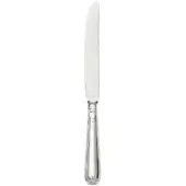 Silver table knife with curved blade, fluted handle, and shell motif, studio shot on white background.