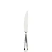 Silver steak knife with curved blade, slender handle, and vertical grooves against a white backdrop.