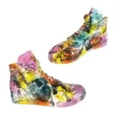 Resin sneaker sculptures, “24h Le Mans Finish” by Juliarte, display layered racing imagery, text collage, pink & purple gradient soles, white background.