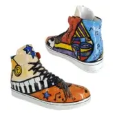 High-top sneakers, Cubist design, piano finish—yellow, blue, red, black—stylized face, keyboard, musical notes, Juliarte signature.