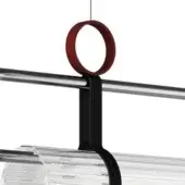 Lighting bracket in matte black with oxide red ring, curved arm, and brushed silver mounting bar, displaying ribbed translucent cylinder.