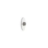 White circular wall plate with central cylindrical metal fixture, secured by silver screws, matte finish, studio lighting.