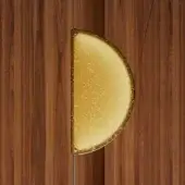 Wall sconce, amber glass and dark metal, semi-circular form mounted on vertical dark brown wood paneling with visible grain.