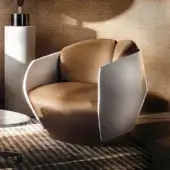 Superior Giorgetti Lorelei lounge chair with warm medium brown leather upholstery and glossy white shell finish