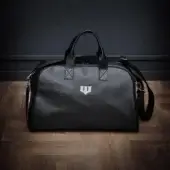 Distinctive WAYNE Enterprises WE-TRAVEL 438 multi sport bag crafted in black leather and carbon fiber textured leather with matte finish