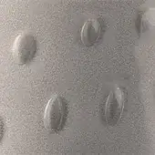 Textured gray surface with uniformly spaced oval indentations, granular matte finish, subtle reflective gloss within each recessed area.