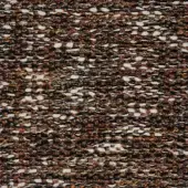 Textile tweed pattern, black, brown, and cream with yellow and orange flecks, featuring a nubby, irregular weave and abstract pebble-like motifs.