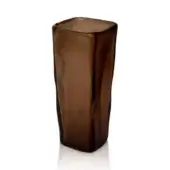 Glass vase, tobacco-colored, twisted form with undulating surfaces and square base, reflecting light on a white background.
