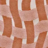Abstract rug with terracotta and blush pink blocks on cream, featuring a dense looped pile texture and irregular, vertical shapes.