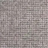 Sicis Eliodoro fabric sample in grey features a raised, geometric pattern resembling cracked earth with a matte finish and subtle brand imprint.
