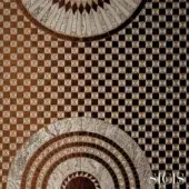 SICIS mosaic fabric, brown and beige geometric pattern, circular motifs with concentric rings, black diamond accents, textile design.