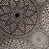 Sicis Numisma Platinum fabric features concentric circles of geometric triangles, platinum and white tones, detailed high-resolution weave.