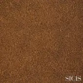 Bolis bronze fabric sample showcases concentric curved lines in a repeating ripple pattern, featuring a mosaic-like texture and tonal variations.