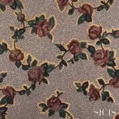 Sicis Xante beige mosaic fabric with repeating stylized roses, burgundy florals, gold accents, and a textured light beige tile background.
