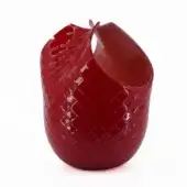 Red glass sculpture, textured with diamond facets, features an organic, undulating form and large open aperture on white background.