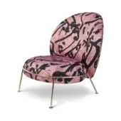Accent chair, black and pink mosaic fabric, rounded back with gold metal legs, modern sculptural design, studio shot.