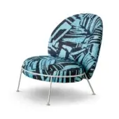 Chair, turquoise geometric fabric, rounded asymmetrical seat, silver metal legs, modern studio shot, “puro aqua” label visible.