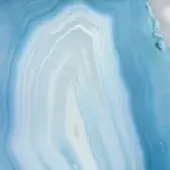 Sicis Vetrite agate surface, blue tones, swirling pattern with translucent and opaque concentric bands, polished glossy finish.