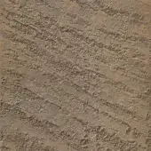 Textured surface sample in camel brown with mottled pattern, granular texture, and undulating quality; faint text reads "ondulato camel sol".