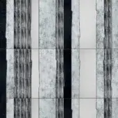 Distressed rectangular pattern with alternating dark and light grey, black panels; vertical linear grain, textured surface resembling weathered stone.