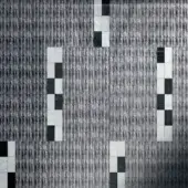 Grey and white mosaic tile pattern with vertical striations, glossy rectangular tiles forming abstract shapes on a textured grey background.