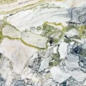 White marble texture with grey, green, and black veining, displaying swirling layered patterns and a polished, reflective surface.