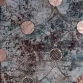 Grey geometric mosaic surface with circular copper discs and teal bands, featuring distressed glass tile and woven dark grey accents.