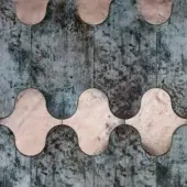 Wall panel, textured grey finish, with metallic pink-gold inserts in scalloped and undulating oval shapes, displaying a mottled, aged appearance.