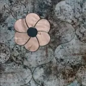 Sicis Vetrite tile panel, grey and copper, features a floral design amidst distressed circular tiles with a mottled, aged appearance.