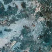 Sicis Vetrite turquoise texture sample displaying layered organic patterns in teal, gray, and white with silver metallic inclusions.