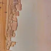 Textured surface, yellow-orange gradient on left, beige striated right; vertical division, fractured landscape pattern, "sicis" text visible.