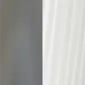 Divided composition of matte gray gradient surface and white ridged texture, featuring vertical linear pattern and diffused lighting.