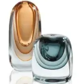 Glass vases, amber and grey, layered concentric design, clear glass shell, glossy finish, hand-blown shape, labeled “polished amber + polished grey – vanity”.