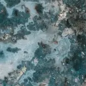 Mottled texture with muted blues, brown, and silver tones displays irregular shapes and weathered cracks creating a diffused, organic pattern.