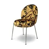Mustard chair with rounded back, gold and black mosaic upholstery, chrome tapered legs, mid-century modern design, white background.