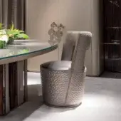 Distinguished Sicis Koro chair with enveloping polyurethane foam padding and muted gray textured coated finish accented by satin metallic banding