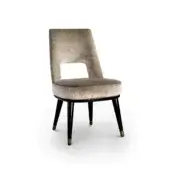 Distinctive Sicis Liam chair with warm taupe fabric upholstery, lacquered legs and metal feet detailing