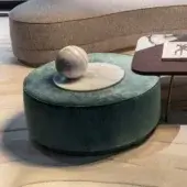 Exceptional Sicis Chamaleon low round ottoman with sumptuous matte velvet textile upholstery and marble accent