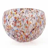 Glass bowl, spotted multicolor, round shape with mosaic glass pieces in orange, yellow, blue, red, and white, studio product shot.