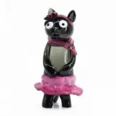 Black glass cat sculpture, ballerina design, pink ribbon and flared skirt, white eyes, glossy finish, translucent quality.
