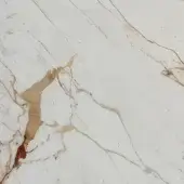 Calacatta gold marble, matte finish, white surface with golden-brown veining in varying thickness and irregular patterns.
