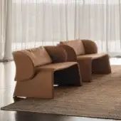 Distinguished Cierre1972 Knight lounge chair with warm medium brown leather upholstery and smooth matte finish