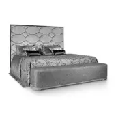 King bed, gray velvet headboard, hexagonal quilting, textured duvet, satin trim pillows, upholstered bench, silver accent, studio shot.