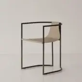 Superior Cierre1972 Jamiro chair with sleek metal frame and refined leather in neutral beige with matte black finish