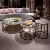Distinguished Sicis Koro side & coffee table set with cylindrical silhouettes and luminous Vetrite glass tops in swirling gray, green, and white hues